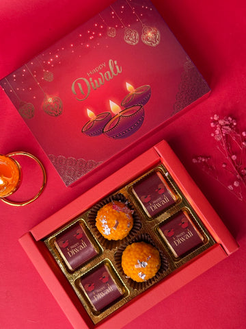 4 CHOCOLATES AND 2 MITHAI CANDLES